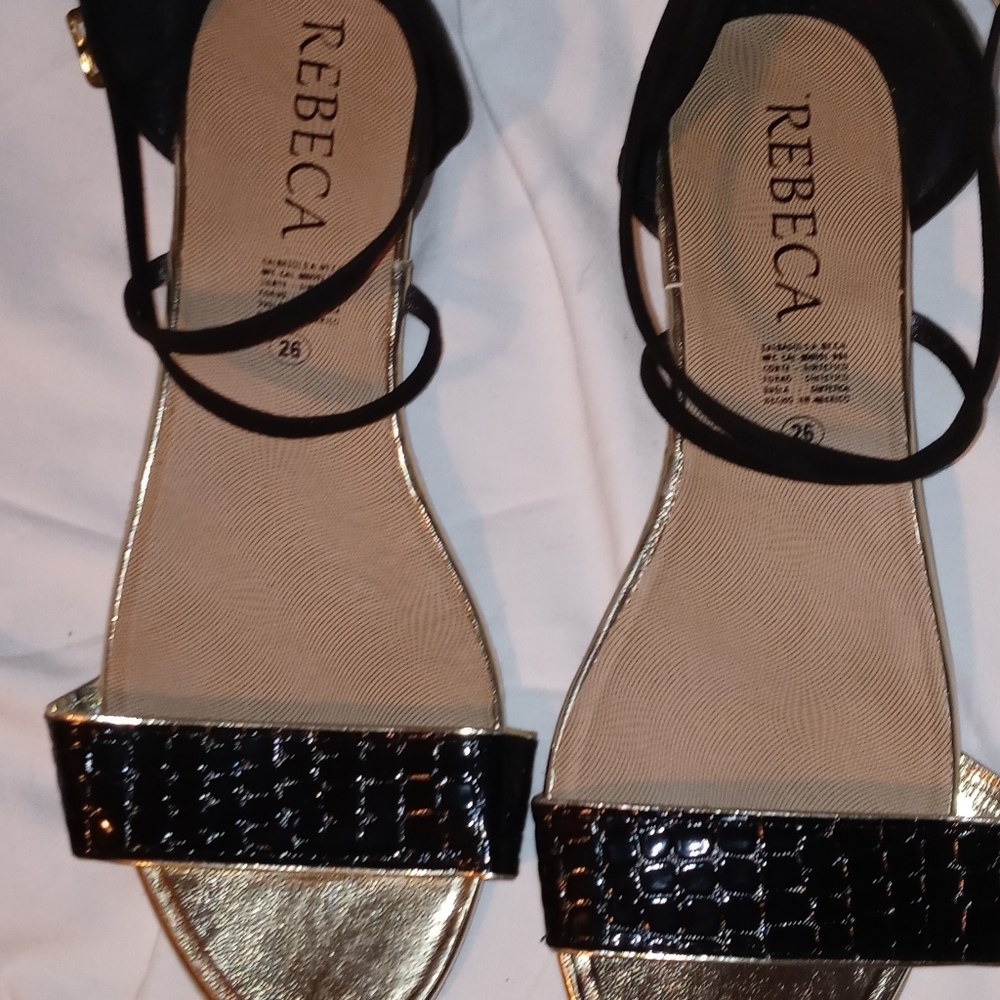 Brand new Rebeca black and gold flats size 10 1/2